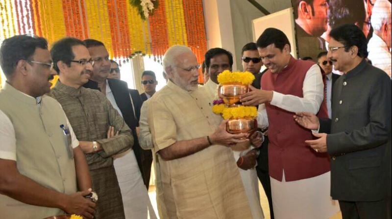 Shiv Sena Chief Uddhav Thackeray with Prime Minister Narendra Modi and Maharashtra CM Fadnavis at the foundation stone laying ceremony. (Photo: Twitter)