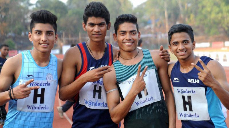 Nisar Ahmed (second from right) has been named in the 14-member contingent of budding young athletes who are selected to train for a training camp in Jamaica. (Photo: PTI)