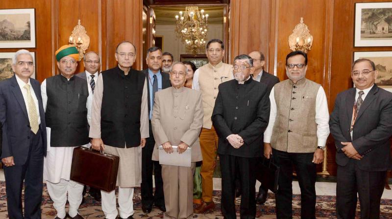 Union Finance Minister Arun Jaitley, MoSes Arjun Ram Meghwal (3rd L) and Santosh Kumar Gangwar (2nd R) alongwith senior officials after presenting the Union Budget 2017-18 to President Pranab Mukherjee, at Rashtrapati Bhavan, in New Delhi on Wednesday. (Photo: PTI)