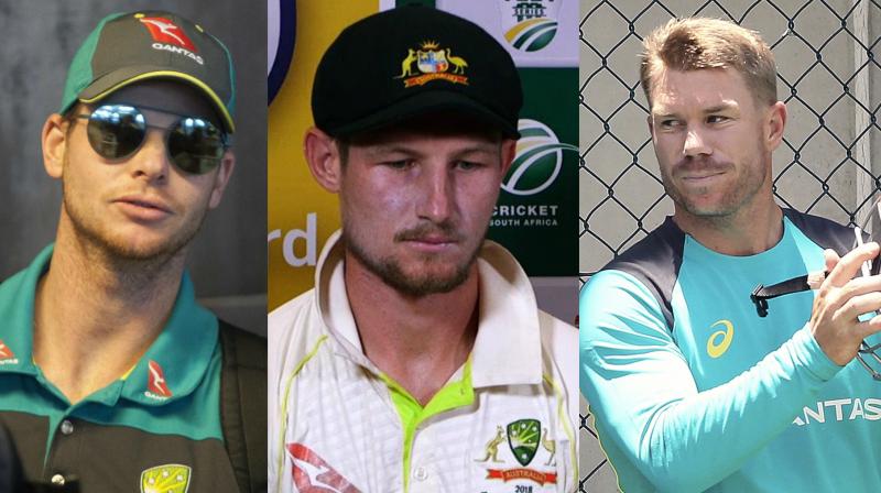 : Australian cricket experienced a black day on Wednesday as Steve Smith and David Warner were banned for a year whereas Cameron Bancroft was banned for nine months respectively in the wake of the ball-tampering scandal. (Photo: AP / AFP)