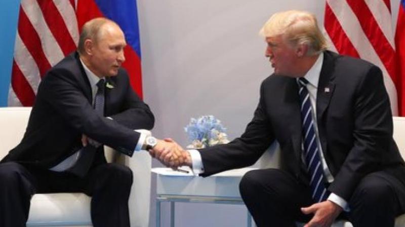 Russian President Vladimir Putin with US President Donald Trump. (Photo: AP)