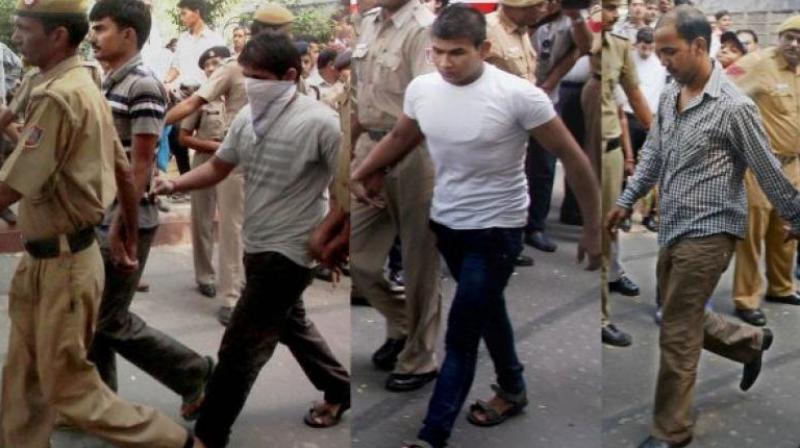 Delhi gangrape convicts Akshay Thakur, Pawan Gupta (face covered), Vinay and Mukesh Singh (R). (Photo: File)