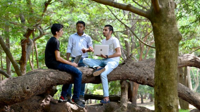 \Ethical hackers\ Anand Prakash (R), Shashank (L), and Rohit Raj (C), who break into computer networks to expose rather than exploit weaknesses, meet at a public park in Bangalore. (Photo: AFP)