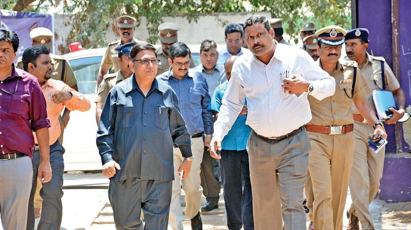 Deputy Election Commissioner Umesh Sinha along with TN chief electoral officer, Rajesh Lakhoni, and district election officer  D. Karthikeyan arriving at Corporation Model school at RK Nagar. (Photo: DC)