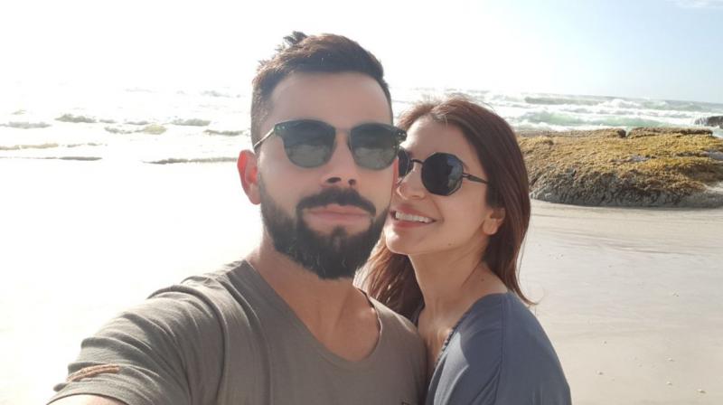 shared an adorable picture with his wife Anuskha on his official Twitter account and captioned the image  Chilling and how!\. (-Photo: Virat Kohli / Twitter)