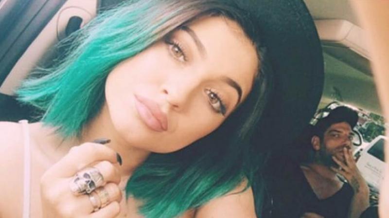 Kylie Jenner sporting green hair.