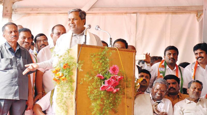 CM Siddaramaiah speaks at a Congress convention at Nanjangud in Mysuru district on Sunday. (Photo: DC)