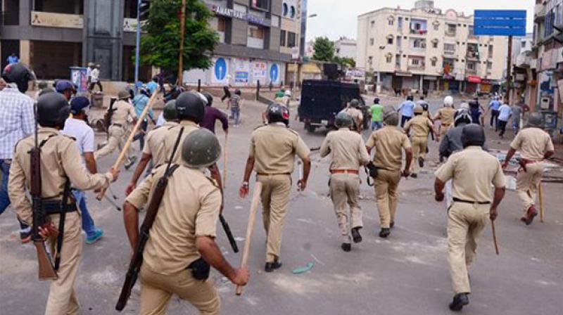 Tension mounted near Gandhi Bhavan when police assaulted two journalists who were covering a protest. (Representational image)