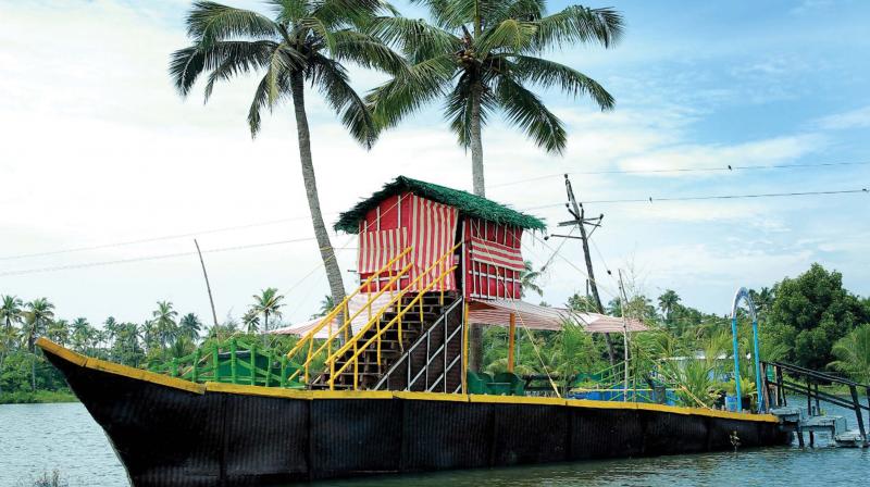 The tree house or erumadam in Njarakkal on a strip created in the shape of a house boat within the backwater.