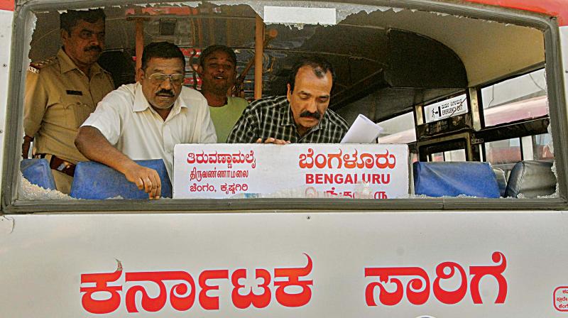 A KSRTC bus that was damaged by stone-throwers in Tamil Nadu on Monday. (Photo: DC)