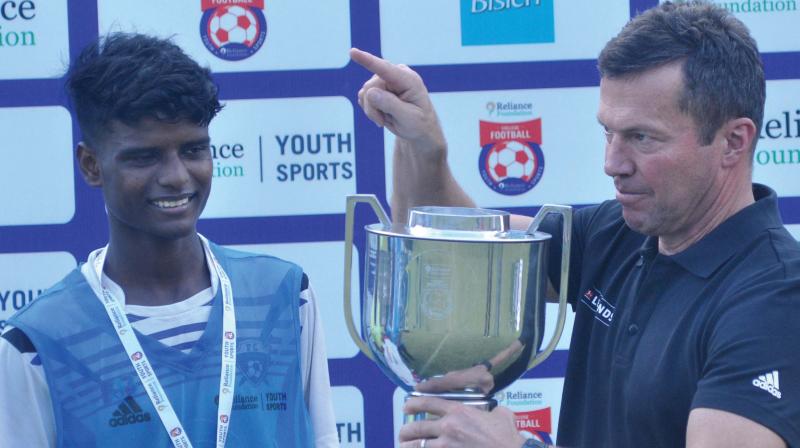 German World Cup-winning captain Lothar Matthaus speaks to a player who took part in the Kochi City Football Final in Kochi on Tuesday. The legendary midfielders visit to the country is part of Bundesliga Legends Tour.