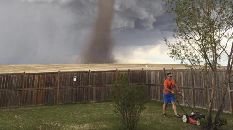 Theunis Wessels said she was woken by daughter who was upset that there was something like a tornado in the sky but her father wouldnt come inside. (Photo: AP)