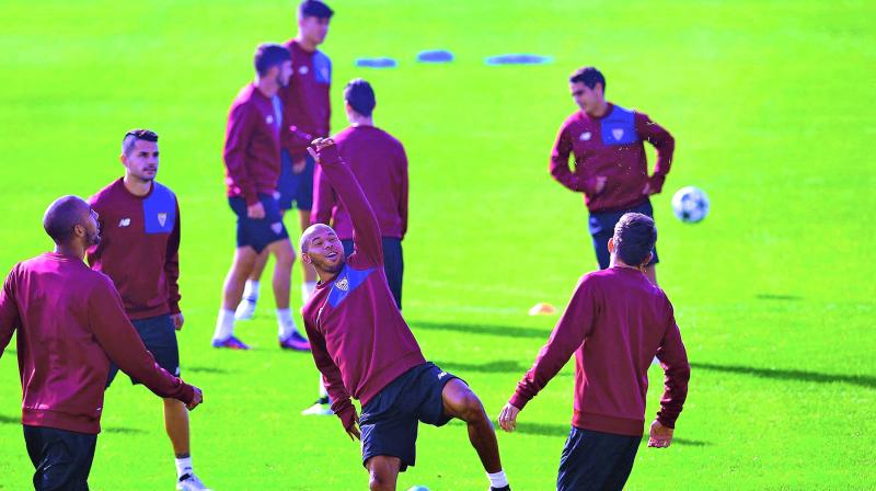 Sevilla players at a training session at the Ciudad Deportiva in Sevilla on Tuesday, the eve of their Champions League match against Dinamo Zagreb. (Photo: AFP)