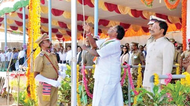 Puducherry Chief Minister V. Narayanasamy unfurls  the tricolour at Liberation Day of the Union Territory on Monday. (Photo: DC)