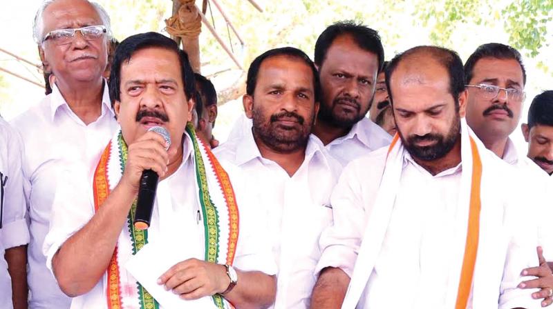 Opposition leader Ramesh Chennithala with Anil Akkara at the venue of the indefinite fast on Thursday. (Photo: DC)