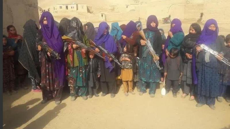 Women holding guns in Jawzjan province in northern Afghanistan. (Photo: Twitter)
