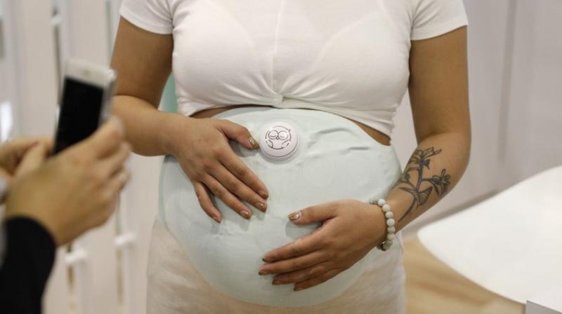 Owlet plans to sell a wearable device that sits over a womans pregnant belly and tracks fetal heartbeats.