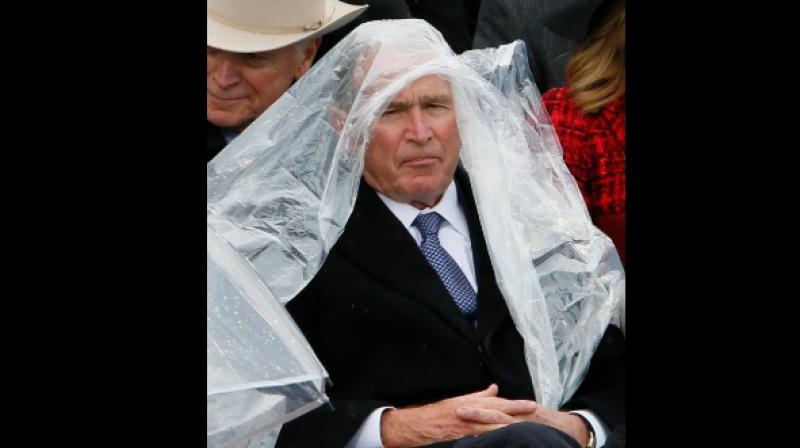 Bushs battle with his poncho went viral on the internet. (Photo: Twitter)