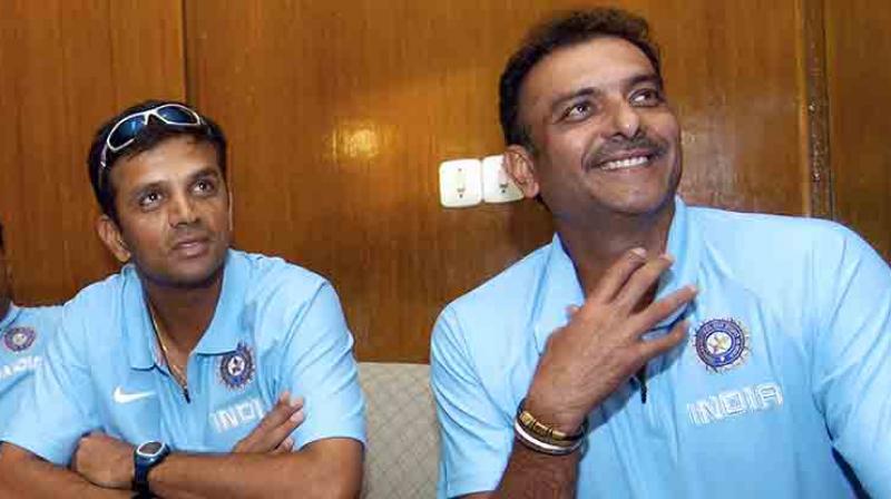 The (CoA) is considering to readdress the prohibition on letting Team India head coach Shastri and India A and U-19 coach Dravid as part of the commentary team in the cash-rich league.(Photo: AFP)