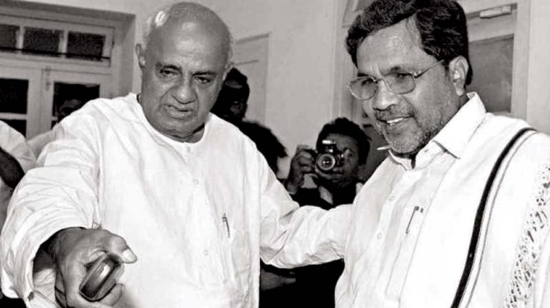 A file photo of former Prime Minister H.D. Deve Gowda and Siddaramaiah.