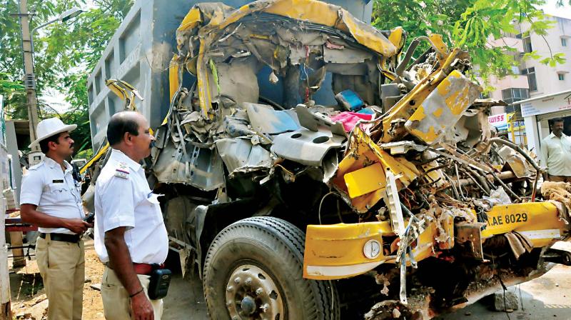 Remains of the truck that rammed into a wall, killing the driver and the owner at Kamalanagar in  Bengaluru on Wednesday (Photo: KPN)