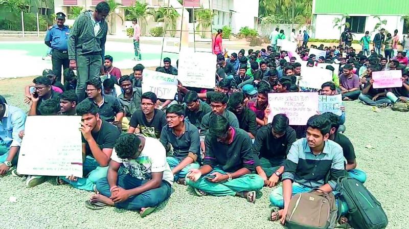 Students stage a protest against the suspension of 15 students, who were involved in Ragging, at the NIT campus at Pedatadepalli in Tadepalligudem mandal in West Godavari on Tuesday.