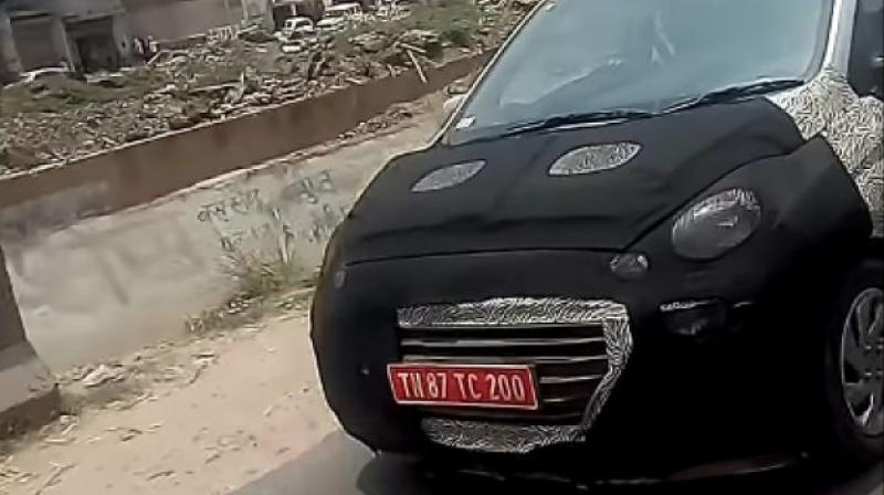 The upcoming hatchback was recently caught on camera revealing Hyundais latest cascading grille.