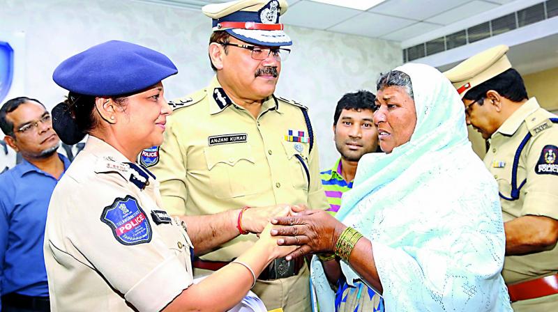 A woman thanks Anjani Kumar, Hyderabad commissioner of police and Shikha Goel, commissioner, crimes and SIT, for rescuing her child as part of Operation Smile.