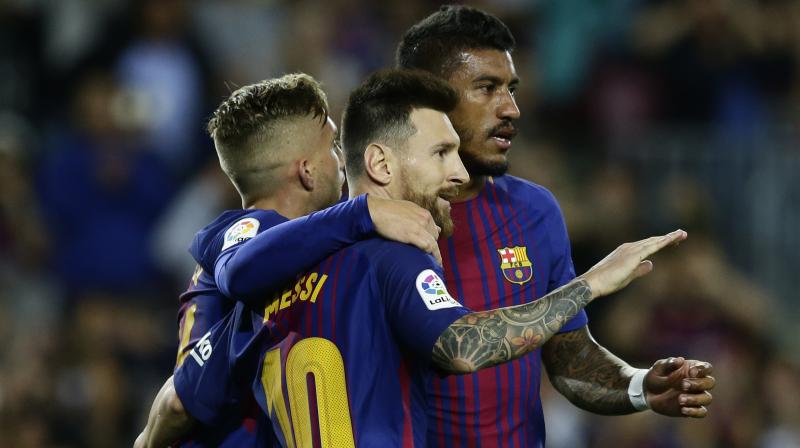 Lionel Messi struck four goals as Barcelona romped to a 6-1 win over Eibar to extend their lead at the top of La Liga. (Photo: AP)
