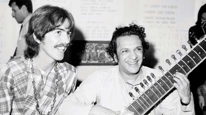 The musician with Pt Ravi Shankar.