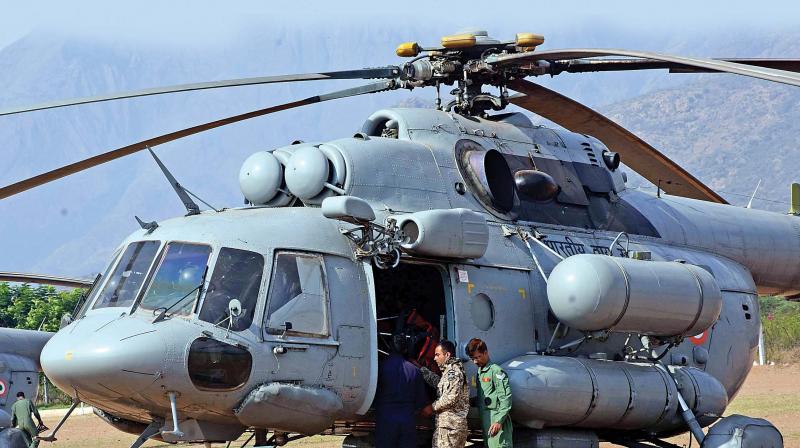 Helicopters attached to Indian Air Force(IAF) were roped in for search and rescue the people injured in forest fire in Kurangani in Theni district, on Monday.