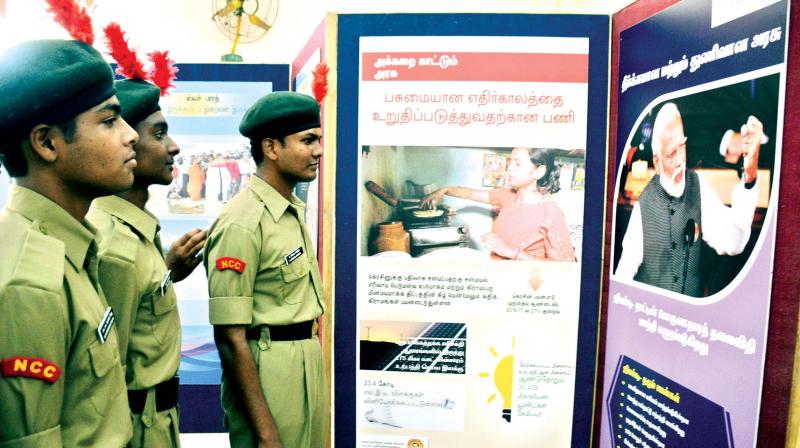 NCC cadets look at the Swachh Bharat exhibition at Loyala college on Monday. IPhoto: DC)