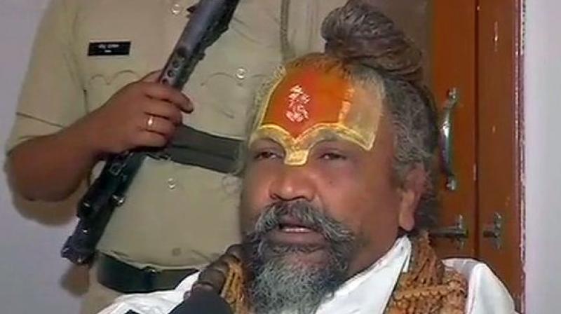 MoS Computer Baba on Wednesday said they have cancelled the campaign because the state government has fulfilled their demand to form a committee of saints and seers for protection of the Narmada river. (Photo: Twitter | ANI)