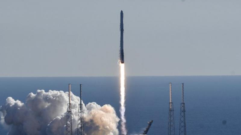 A SpaceX Falcon 9 rocket lifts off from newly refurbished Pad 40 at Cape Canaveral Air Force Station, in Cape Canaveral, Fla, Friday, Dec. 15, 2017. The rocket is carrying supplies to the International Space Station. (Craig Bailey/Florida Today via AP)
