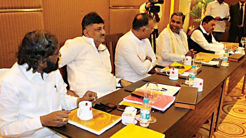 Top Congress leaders at a meeting in Bengaluru on Monday.
