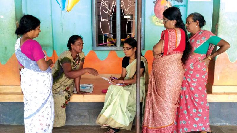 KeSCPCR member J. Sandhya (third from left) talks to refugees at Government New LPS Purakad on Friday.