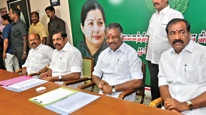 Chief Minister Edappadi K. Palaniswami and Deputy Chief Minister  O. Paneerselvam at the party meeting held on Wednesday. (Photo: DC)