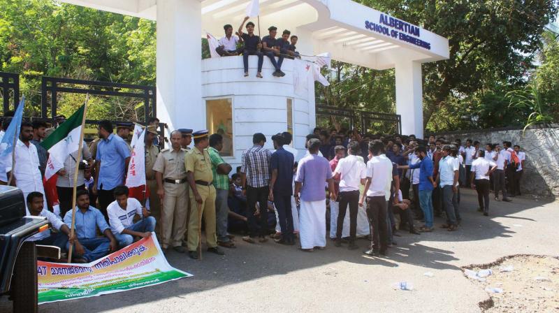 Students protest outside Albertian Institute of Science and Technology in Kochi on Monday. (Photo: ARUNCHANDRA BOSE)