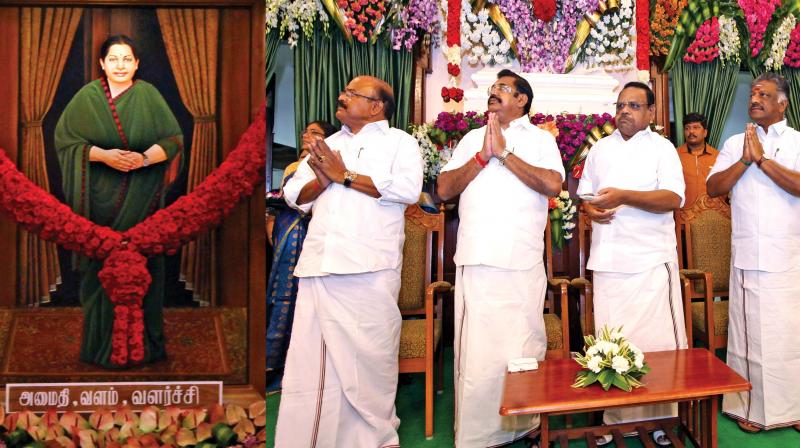 Tamil Nadu Assembly Speaker P. Dhanapal unveiling a portrait of J. Jayalalithaa in the assembly hall on Monday. Chief Minister Edappadi K. Palaniswami and other ministers were present in the occasion. (Photo: DC)