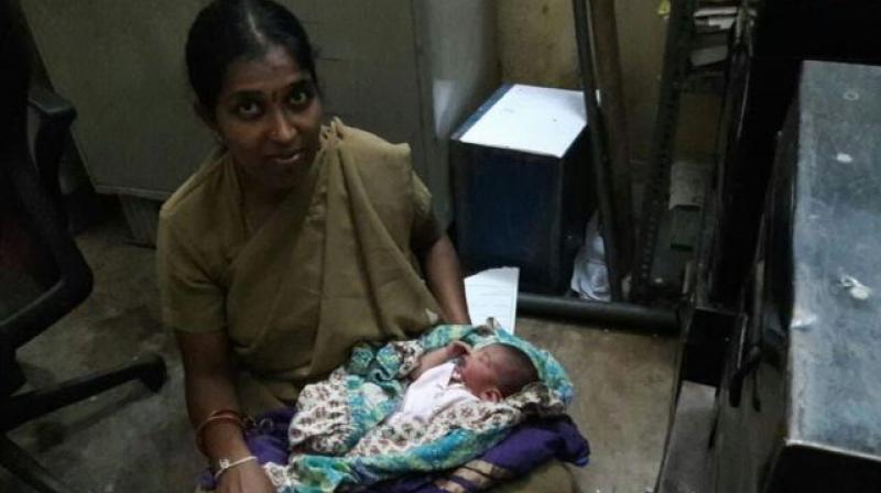 Constable Archana, who had returned to work after a three-month maternity leave, couldnt bear the newborns cries and decided to breastfeed the baby. (Photo: ANI)