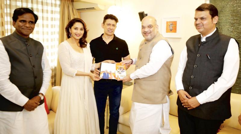 The meeting lasted for around 40 minutes and took place at Madhuri Dixits suburban residence in Mumbai. (Photo: Twitter | @AmitShah)