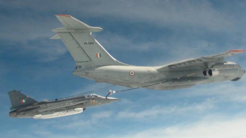 The first ever mid-air refuelling of the indigenously developed light combat aircraft Tejas was successfully carried out on Monday, Hindustan Aeronautics Ltd (HAL) said. (Photo: Twitter | @DefenceMinIndia)