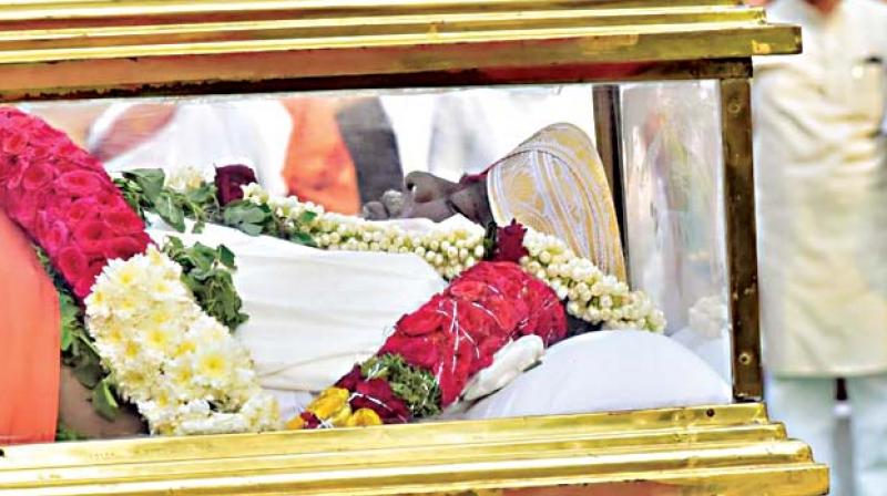 The mortal remains of the departed leader before the funeral