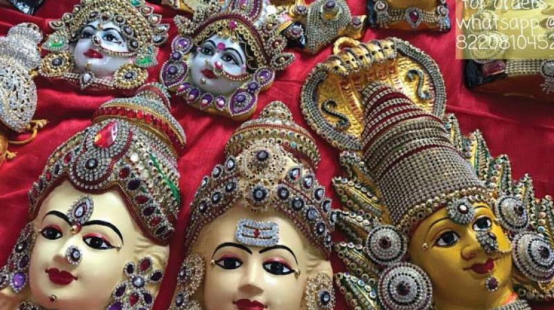 On Vara Mahalakshmi, when the devout make their invocations to the Goddess of Wealth, masks depicting the deitys face make their customary appearance in city homes.