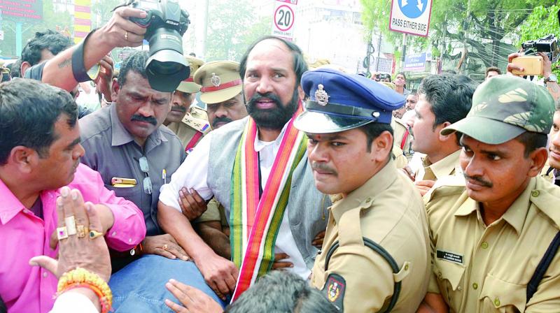 TS Congress president Uttam Kumar Reddy is being led away by cops during a protest against demonetisation in Hyderabad on Monday. (Photo: DC)