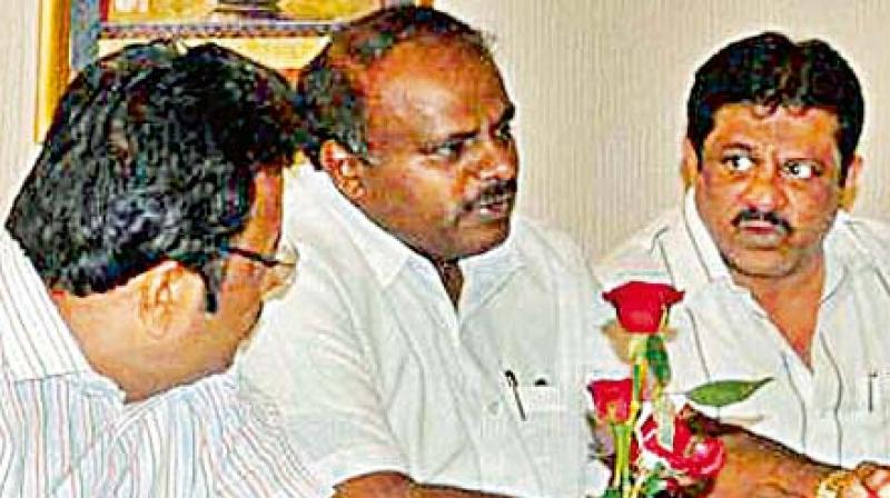 A file photo of State JD(S) president H.D. Kumaraswamy with partys rebel MLAs Zameer Ahmed Khan and Cheluvarayaswamy