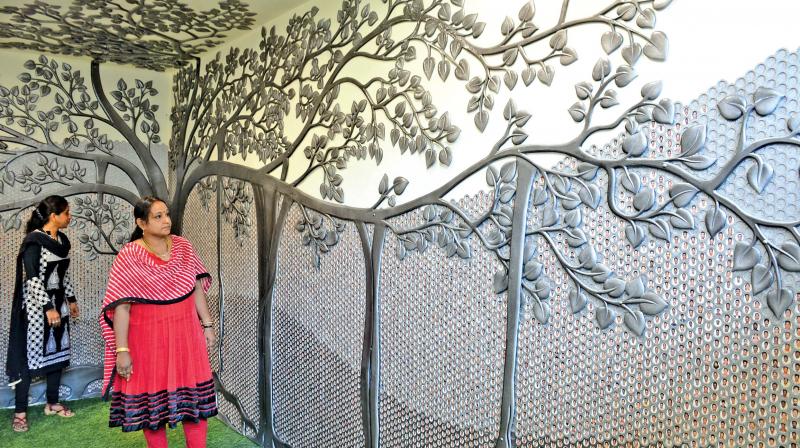 A massive tree featuring photos of all 11,300 employees of the Integral Coach Factory (ICF) has been carved in the administrative building (Photo: DC)