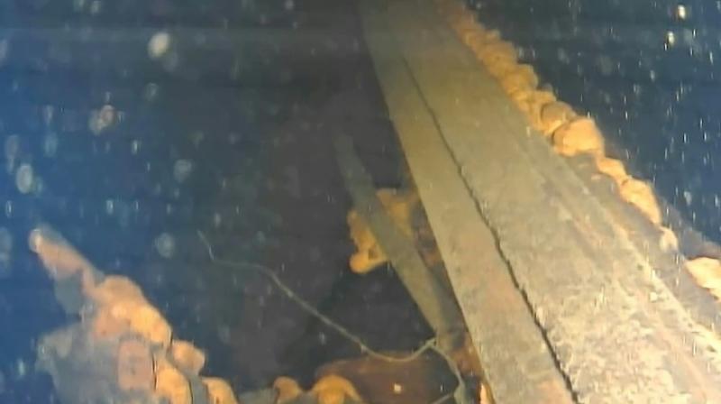 This handout video grab taken with an underwater robot and provided by Japans International Research Institute for Nuclear Decommissioning on July 21 shows a part of the pedestal wall inside reactor No. 3 at Fukushima nuclear power plant. (Photo: AFP)