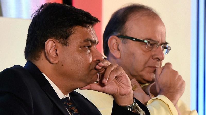 RBI Governor, Urjit Patel and Union Finance Minister, Arun Jaitley during a conference ahead of BRICS Summit, in Mumbai. (Photo: PTI)