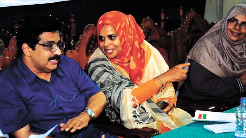 Womens Welfare Association of Kerala (WWAF) president Adv Laila Ashraf has a word with M.K Muneer MLA at the venue of the seminar conducted by WWAF in Kozhikode on Saturday. (Photo: DC)
